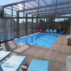 Hébergement de vacances 12 Pers Climatisée, Piscine Chauffée Couverte Ou Non,2km Mer, Golf, Jardin 